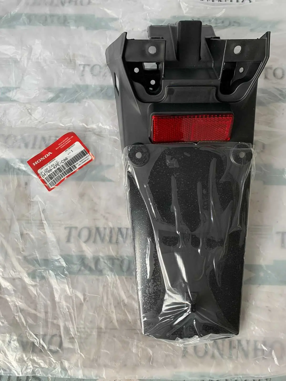 SUPORTE DE PLACA C/ REFLETOR HONDA XR250 TORNADO 2001 À 2008