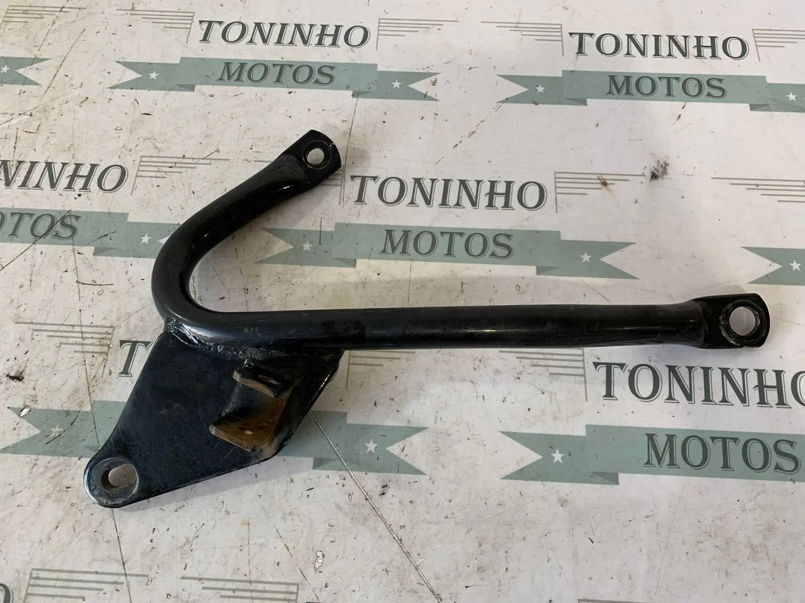 SUPORTE DE PEDALEIRA TRASEIRA DIREITO YAMAHA FACTOR 125 2009