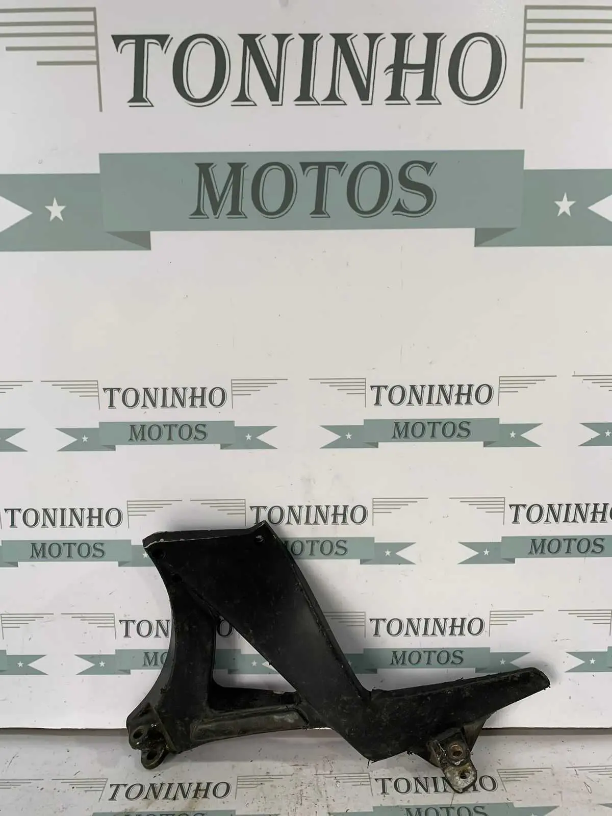 SUPORTE DE PEDALEIRA LADO ESQUERDO BUELL XB 12X 2006