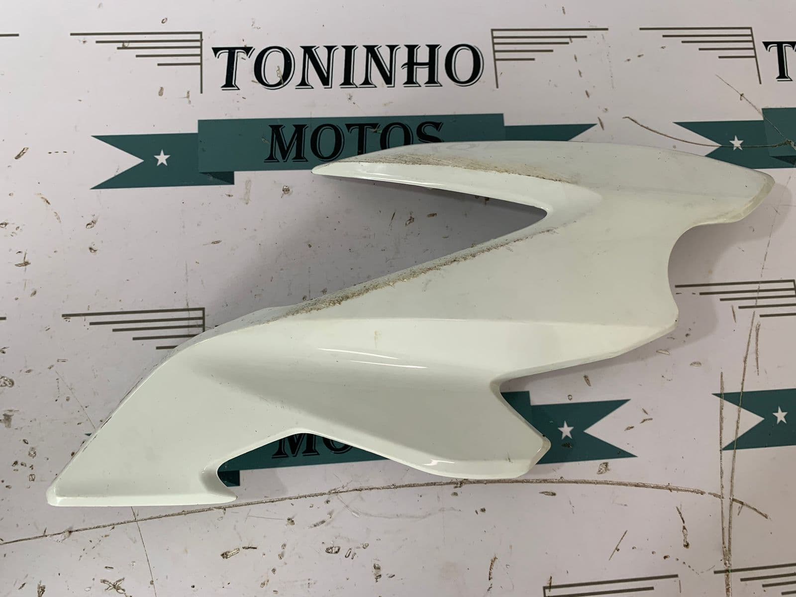 ACABAMENTO LATERAL FAROL ESQUERDO HONDA BROS 160 2022