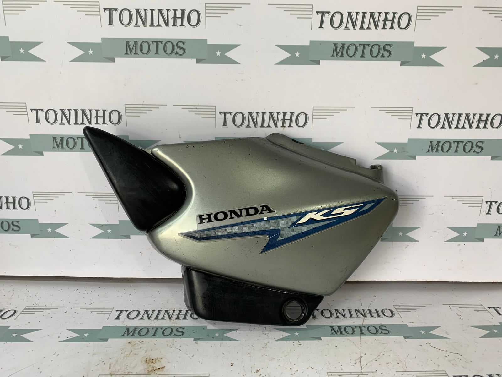 TAMPA LATERAL LADO ESQUERDO HONDA TITAN 125 / FAN 125