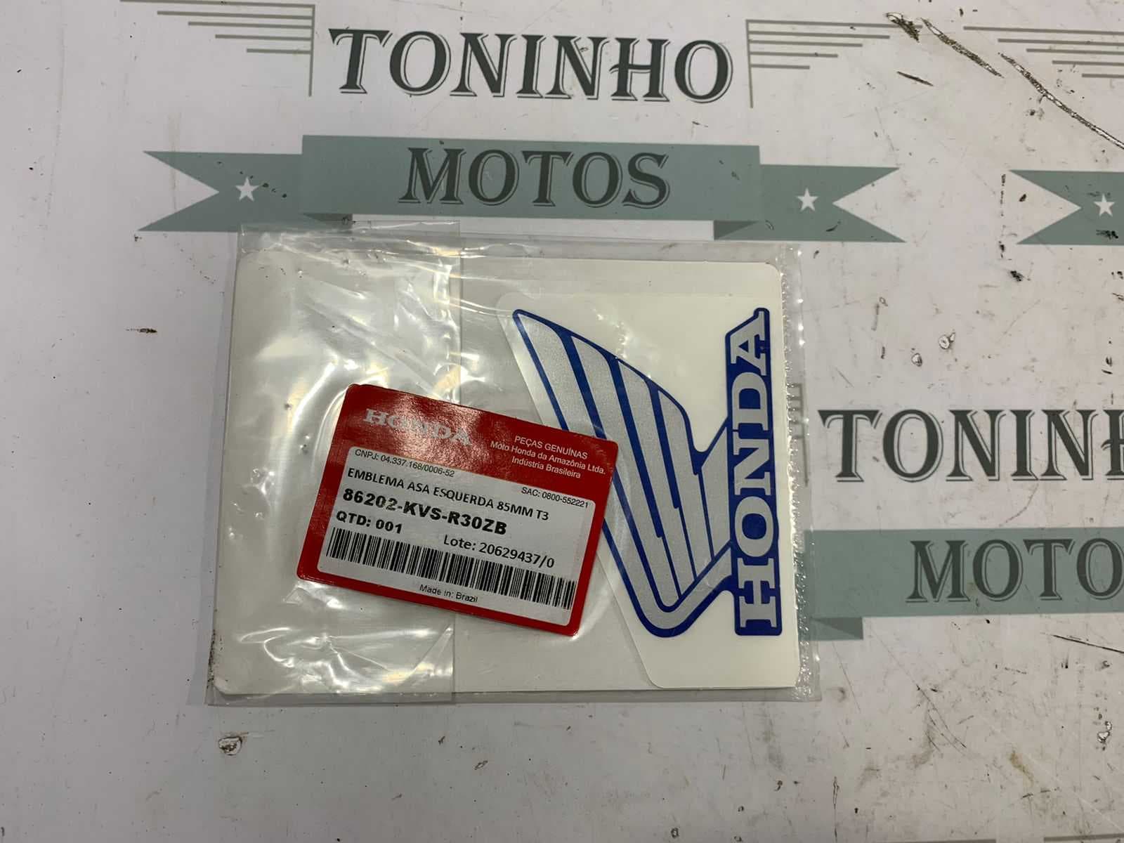 EMBLEMA ABA DE TANQUE LADO ESQUERDO HONDA CG160 2020