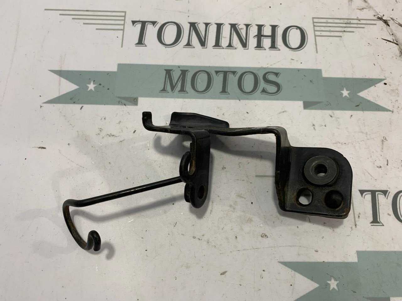 SUPORTE FAROL / PISCA DIANTEIRO DIREITO HONDA BROS 125 2003