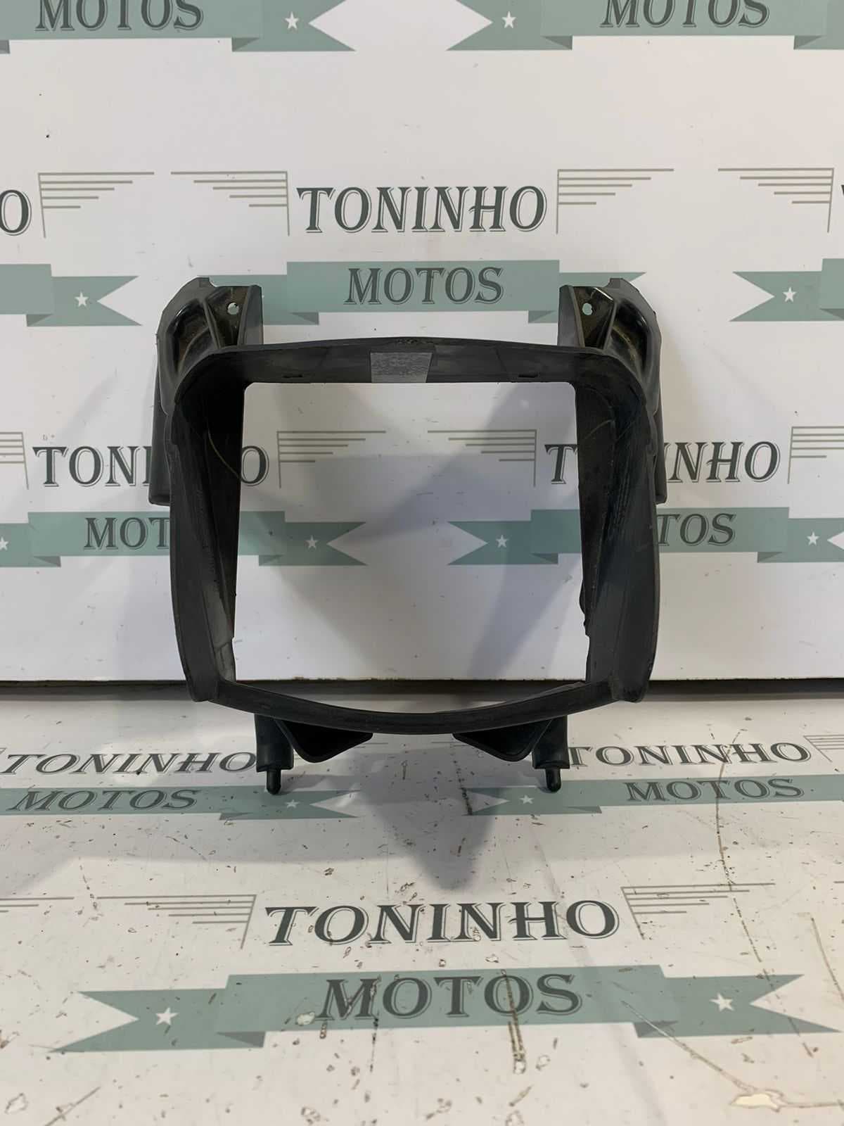 MOLDURA INFERIOR FAROL HONDA BROS 125 2013 / BROS 150 2009