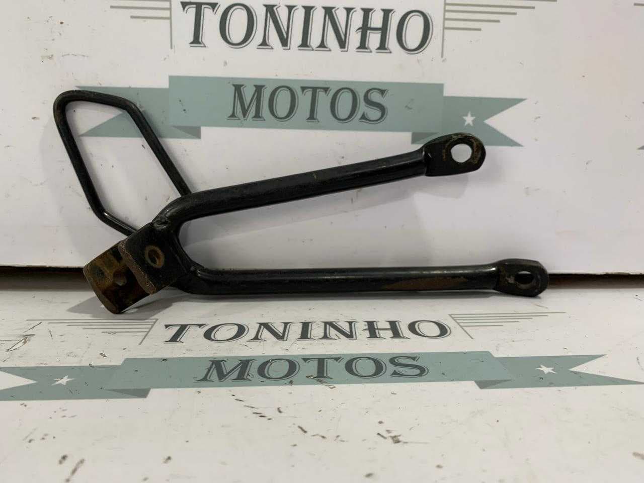 SUPORTE PEDALEIRA TRASEIRA DIREITO HONDA TORNADO 2001 À 2008