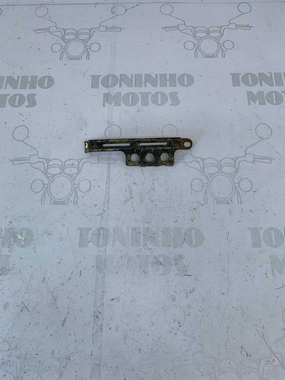 TRAVA DA BATERIA HONDA NX150 1989 À 1992 / NX200 1994 Á 2002