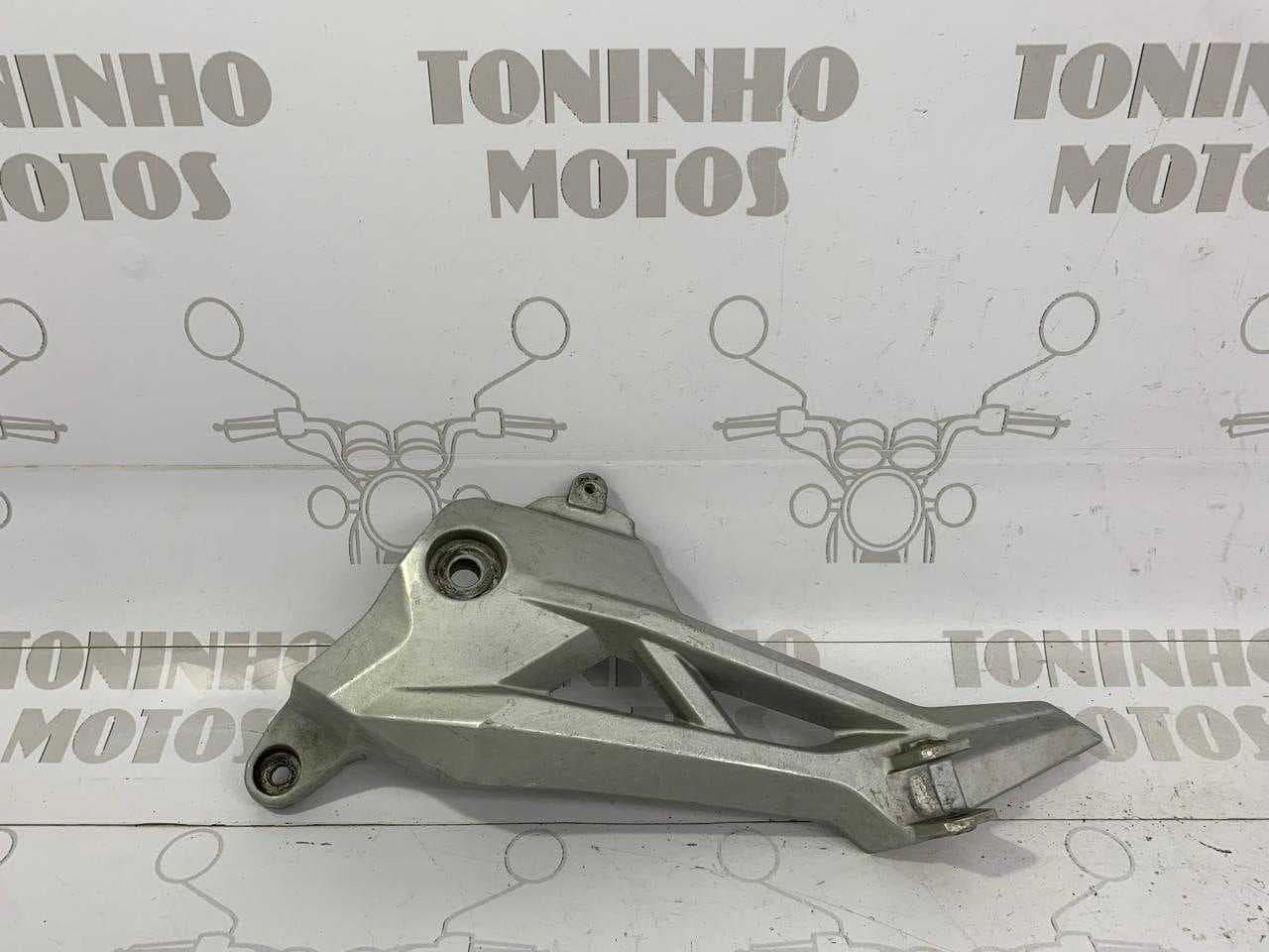SUPORTE PEDALEIRA ESQUERDO HONDA FAN 160 / START 160 / CARGO