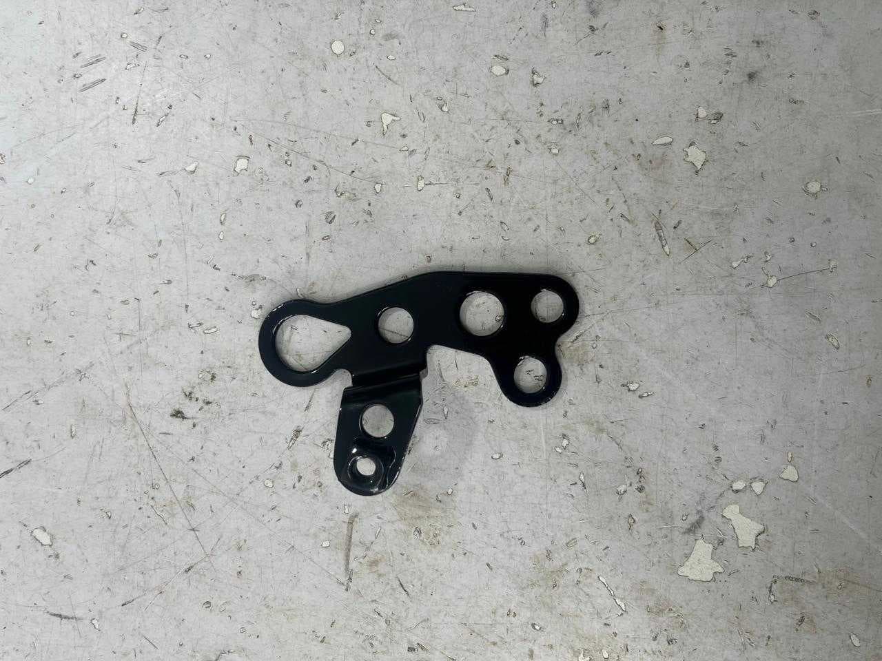 SUPORTE ESQUERDO FAROL /PISCA YAMAHA XTZ 125 2003 À 2008