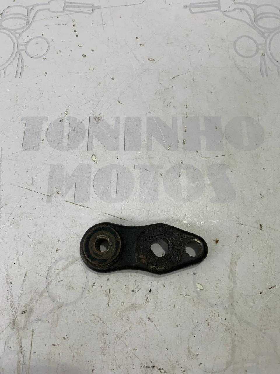 SUPORTE PISCA LADO ESQUERDO HONDA NX 150 1989 / NX 200 1994