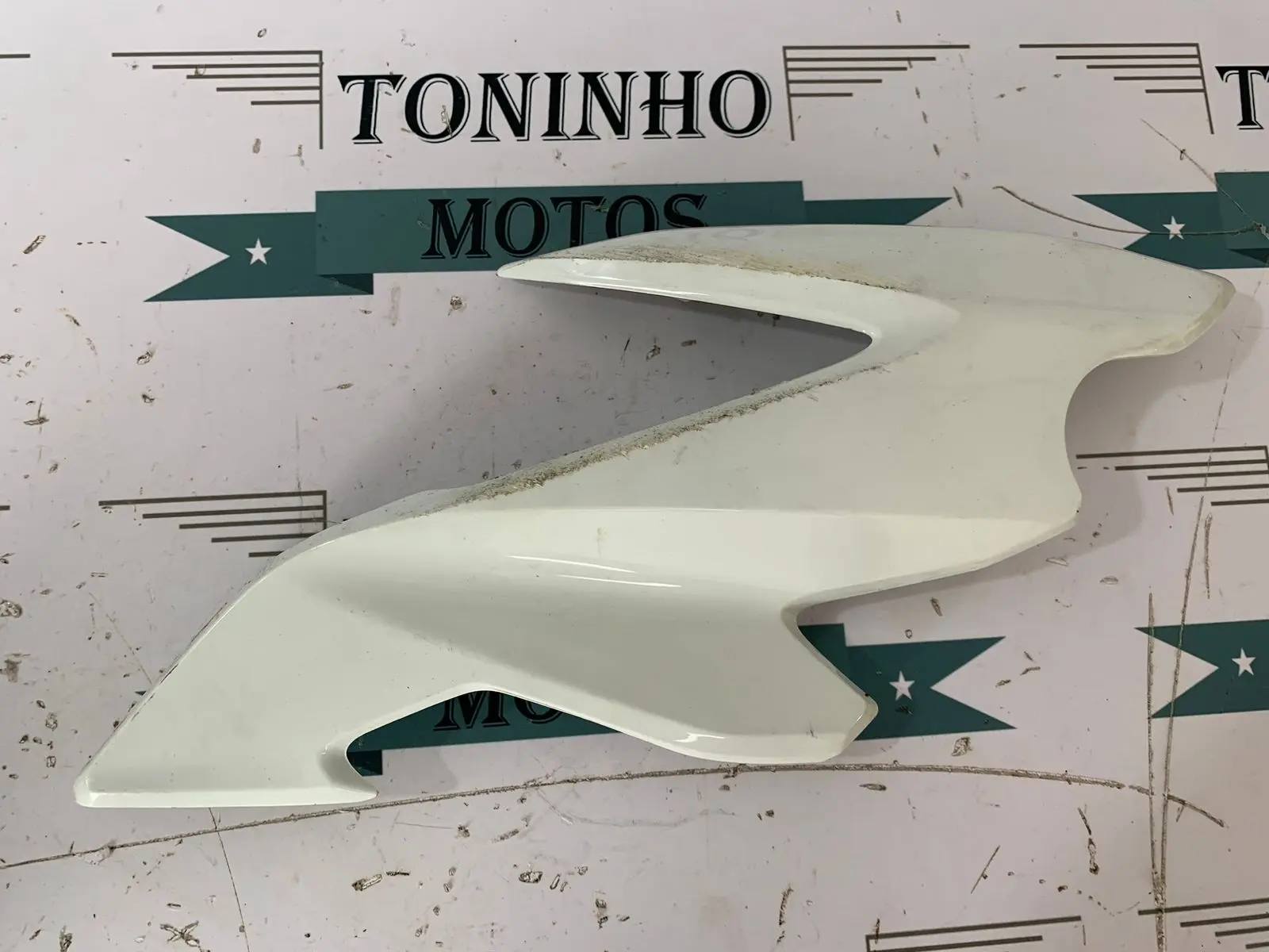 ACABAMENTO LATERAL FAROL ESQUERDO HONDA BROS 160 2022