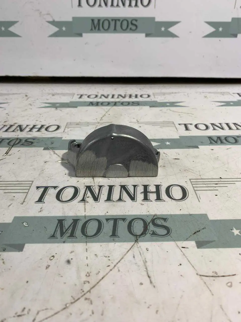TAMPA CORRENTE BOMBA DE ÓLEO TRIUMPH TIGER 800 XC