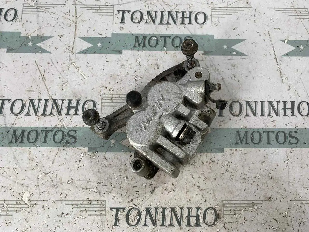 PINÇA DE FREIO DIANTEIRO ESQUERDO HONDA XL 700 VA TRANSALP