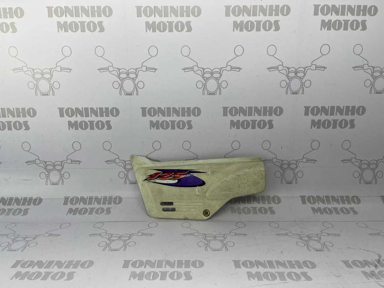 TAMPA LATERAL LADO ESQUERDO HONDA NX 150 / NX 200 / XLR 125