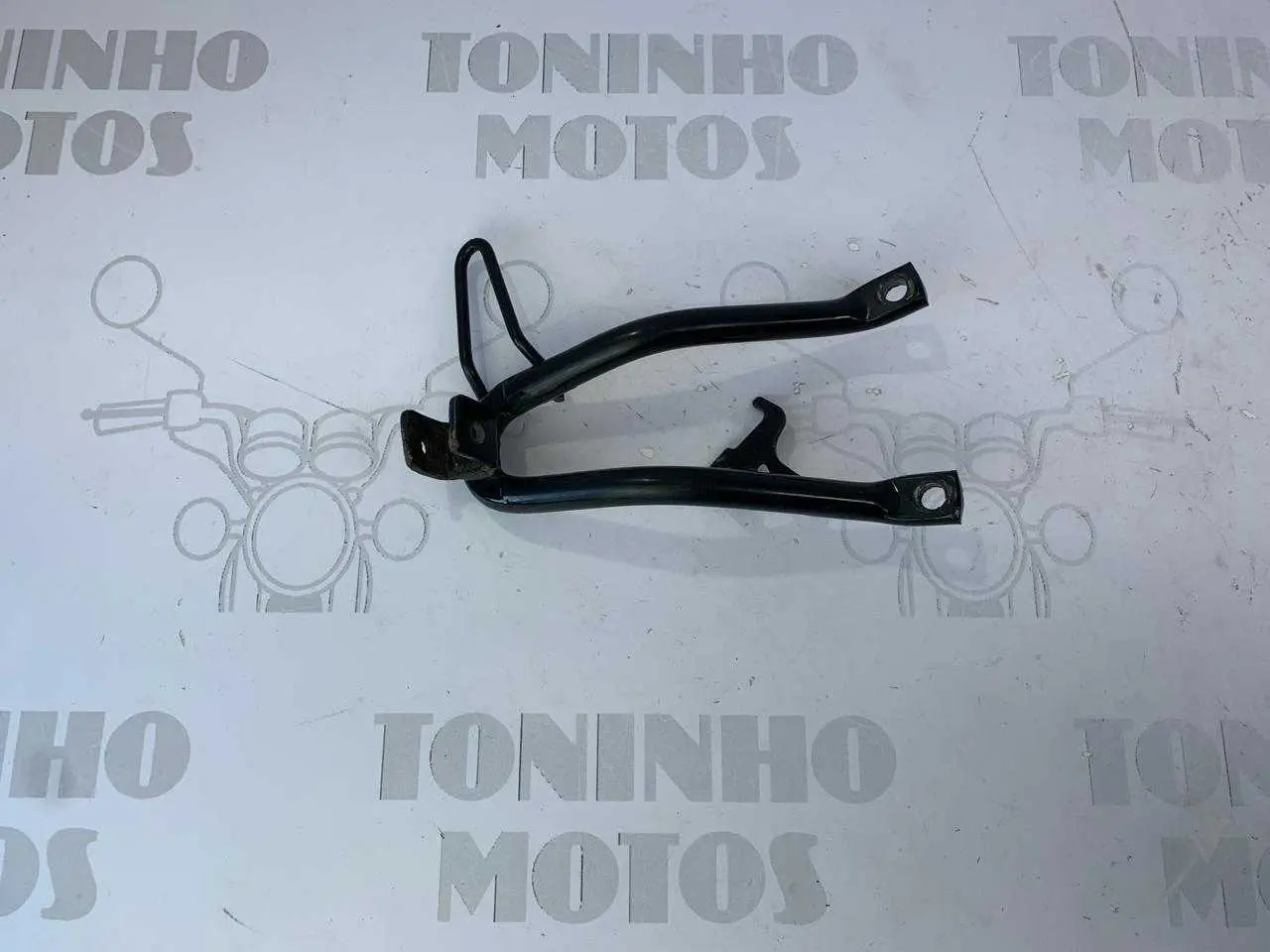 SUPORTE PEDALEIRA TRASEIRA DIREITO YAMAHA LANDER 250 2024
