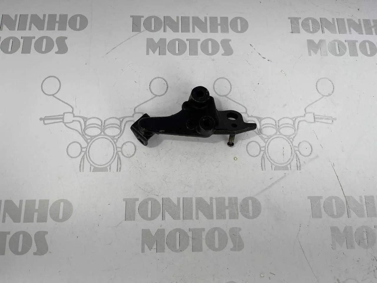 SUPORTE PEDALEIRA DIANTEIRA ESQUERDO YAMAHA XT660 2005
