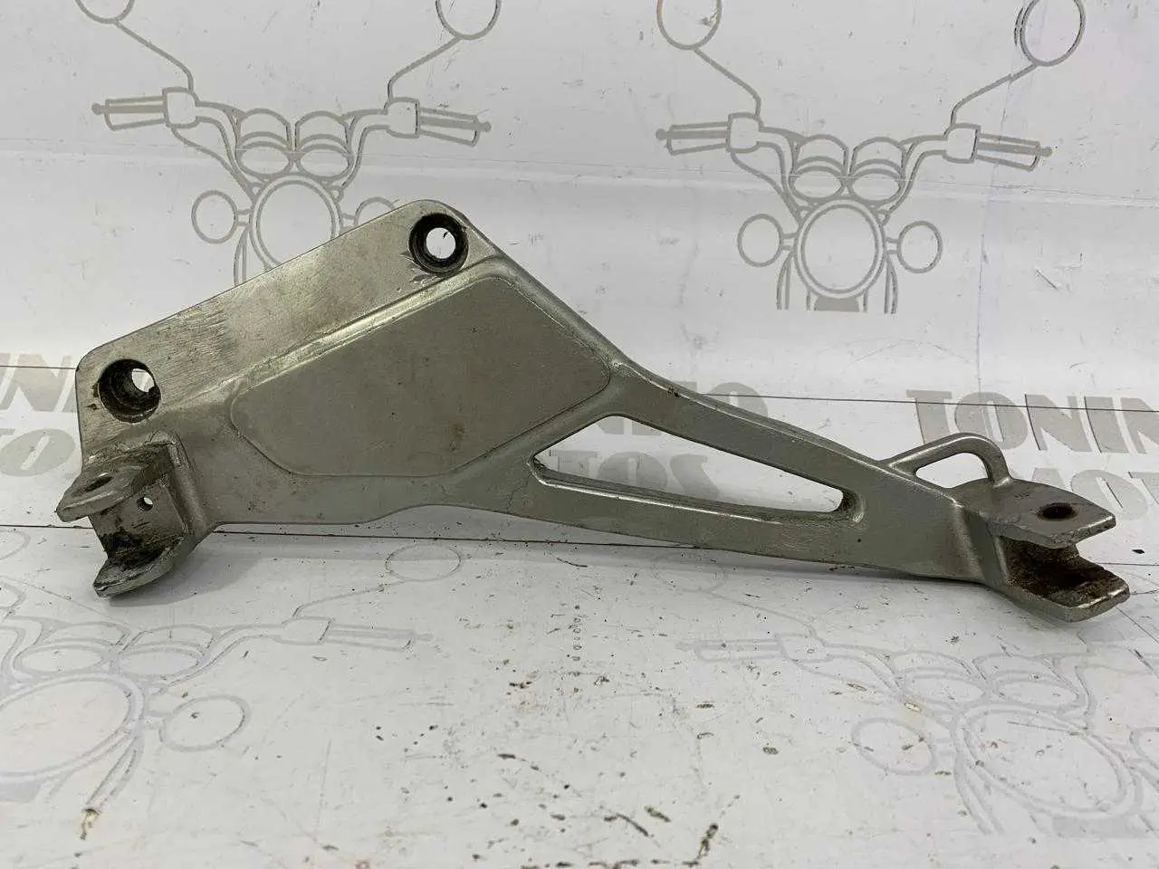 SUPORTE DE PEDALEIRA LADO ESQUERDO HONDA CB500 1998 Á 2004