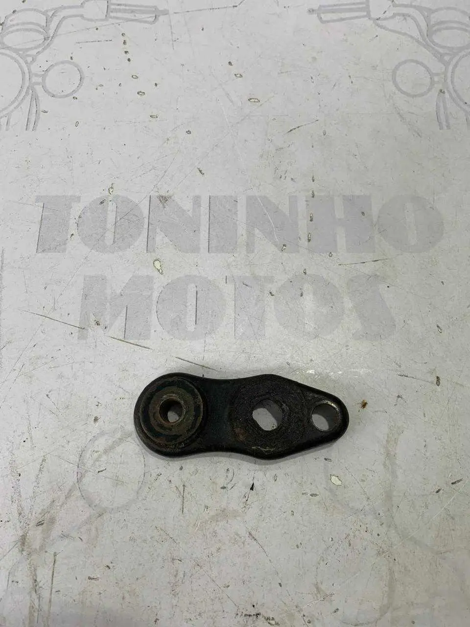 SUPORTE PISCA LADO ESQUERDO HONDA NX 150 1989 / NX 200 1994