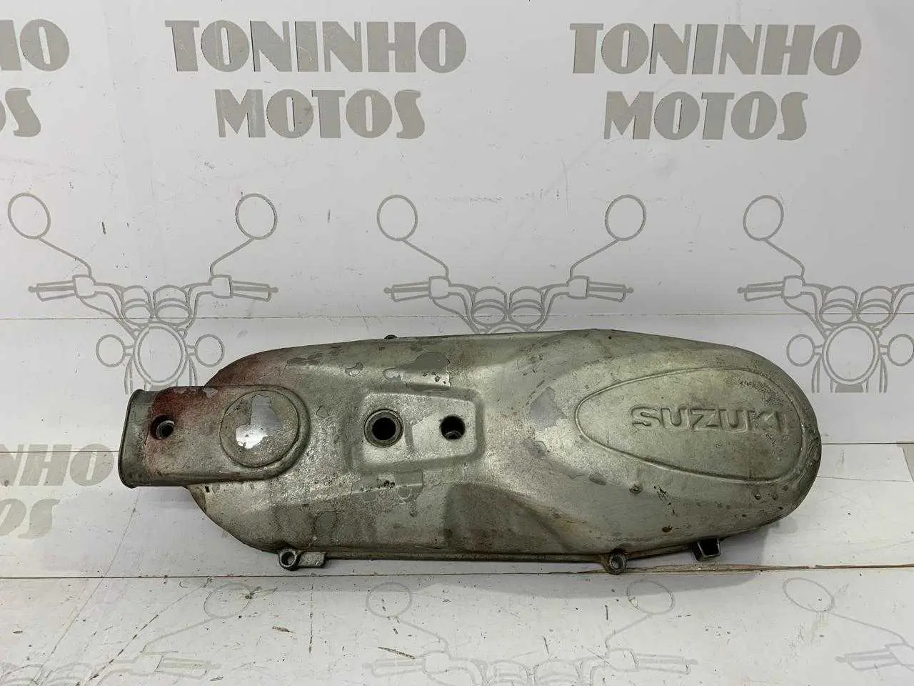 TAMPA DO MOTOR ESQUERDO SUZUKI BURGMAN 125 I 2011 Á 2019